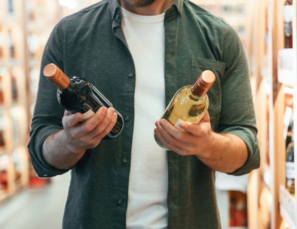 Welke fles neem je mee als je ergens wordt uitgenodigd? 8 situaties en de keuze die past
